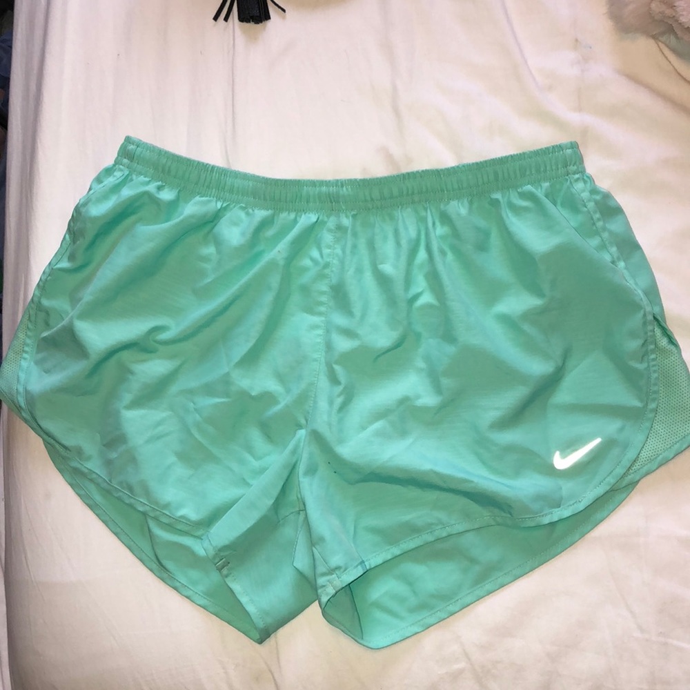 nike runner dri- fit bright teal shorts